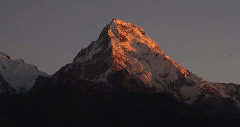 Clouds above Annapurna range at sunset Himalayas Nepal