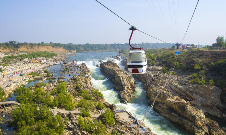 Get into a Thrilling Cable Car Ride over the Dhuandhar Falls