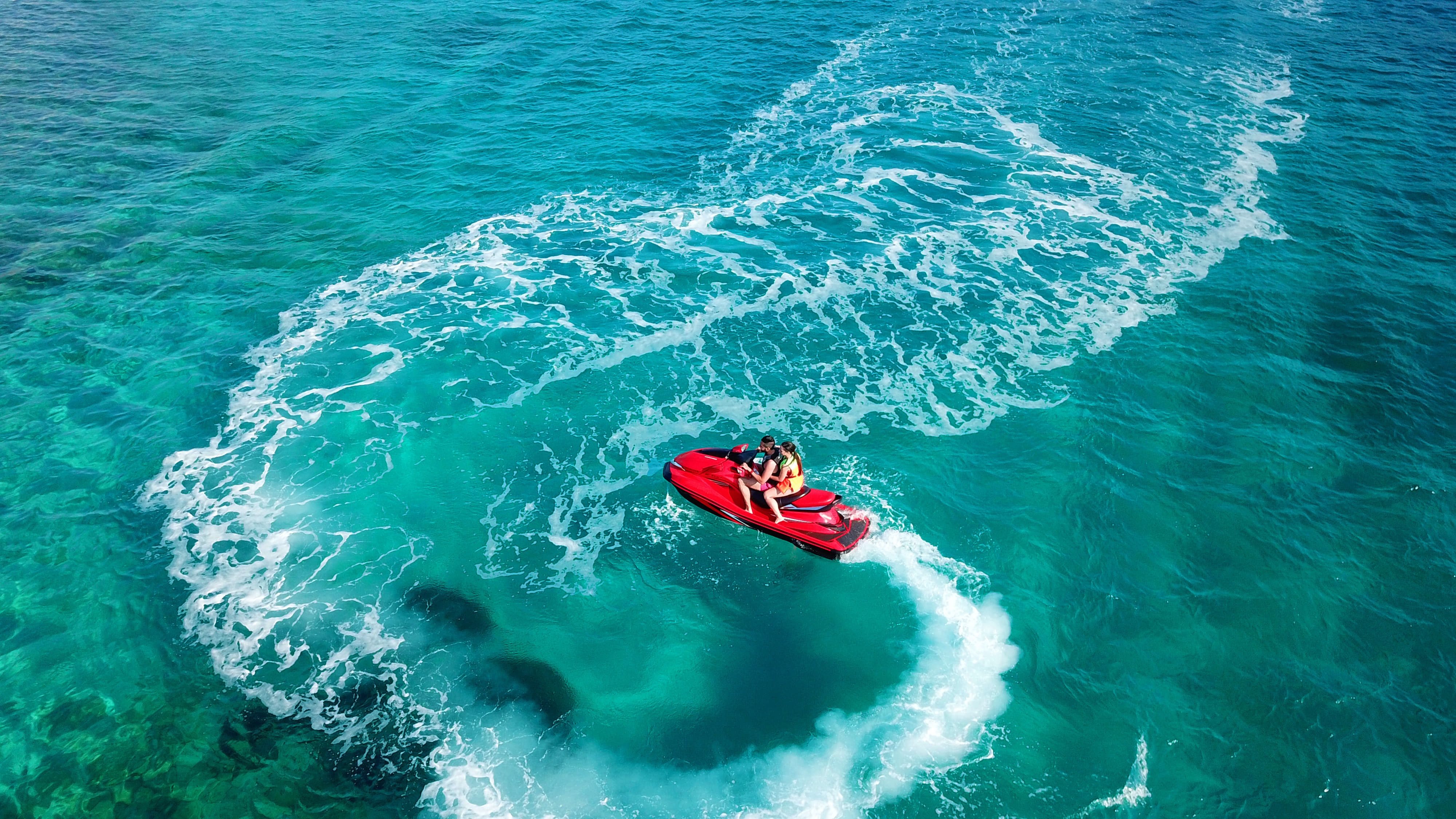 Try Jet Skiing at Corbyn’s Cove Beach