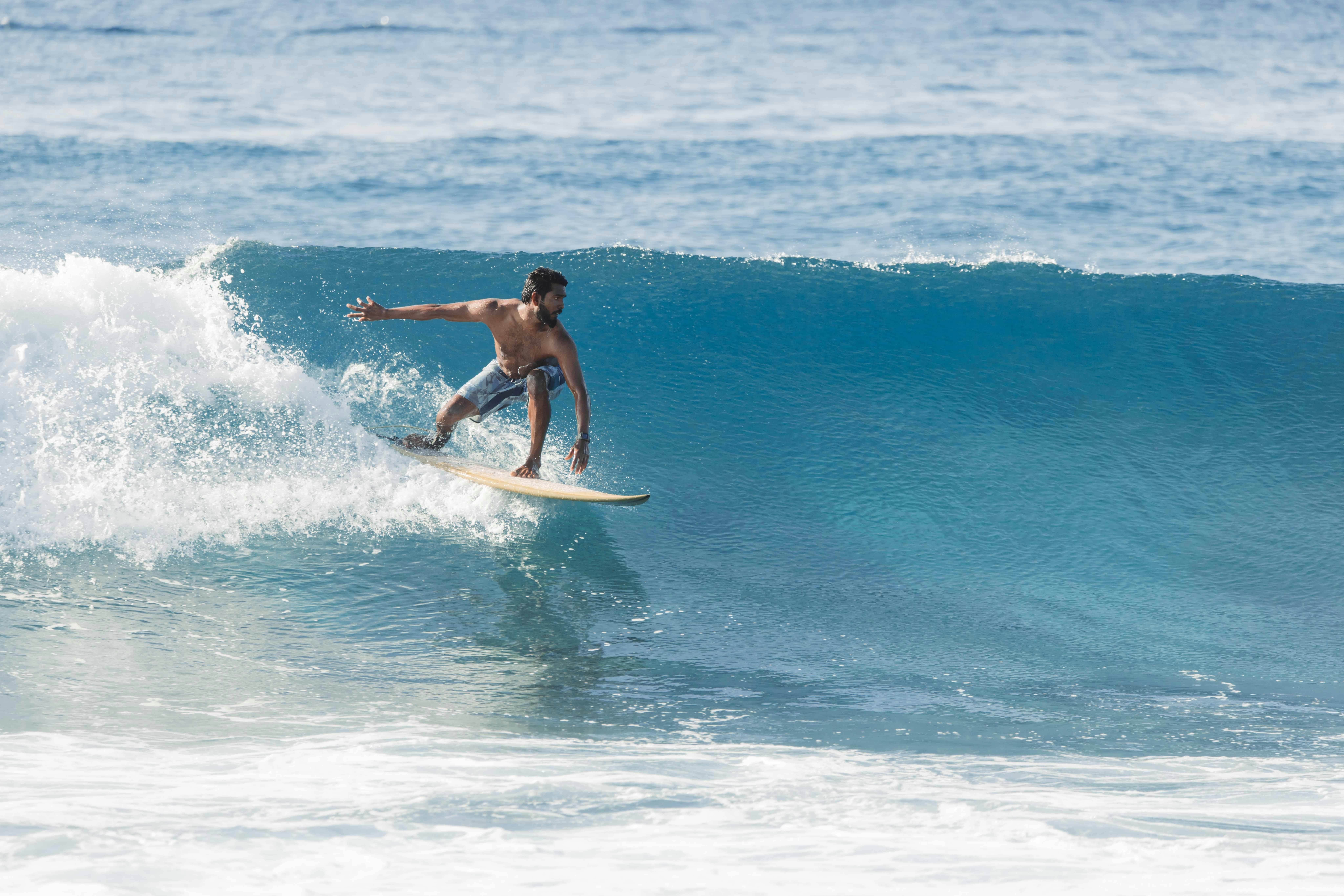 Try surfing in North Malé Atoll